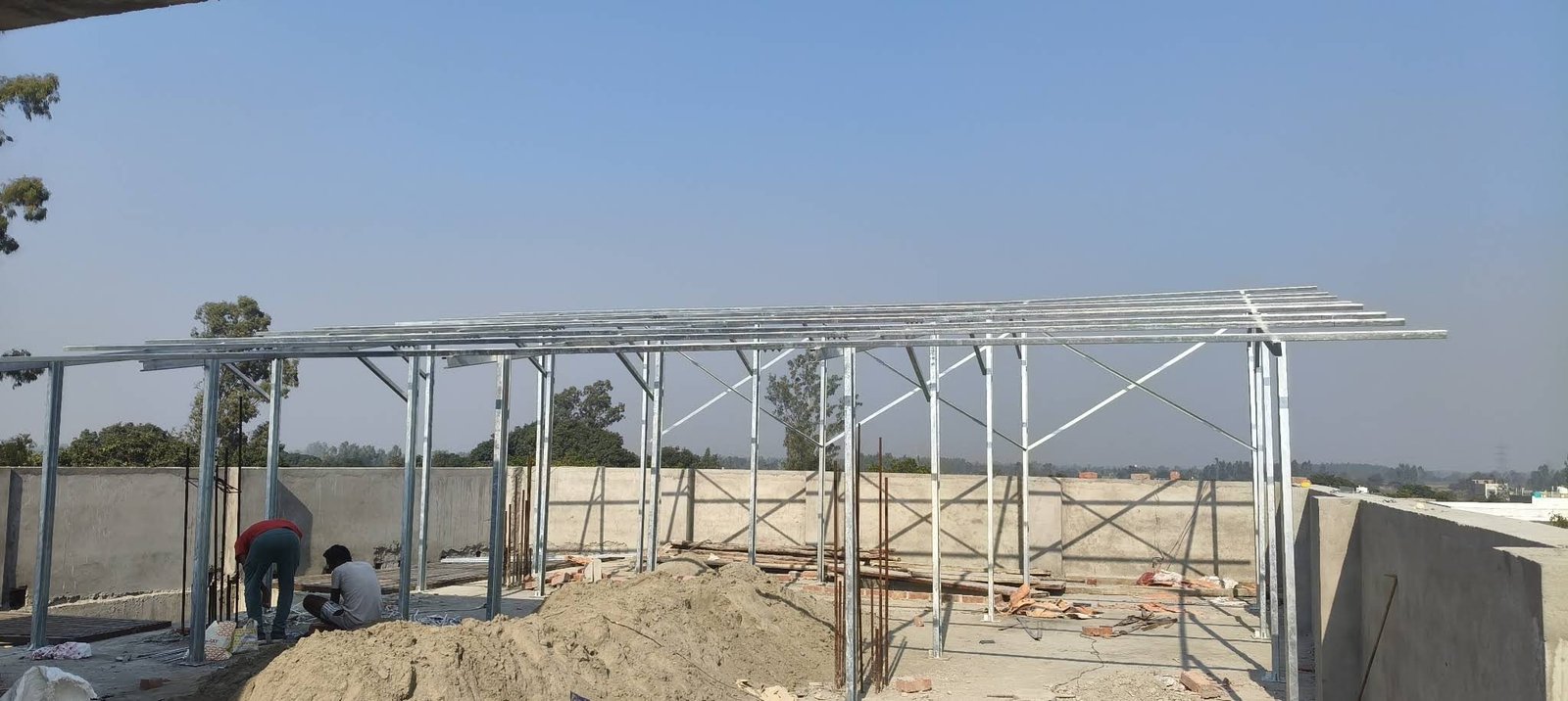 Rooftop solar mounting structure under construction